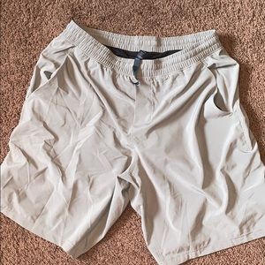 Tan Lululemon Athletica shorts size L with liner